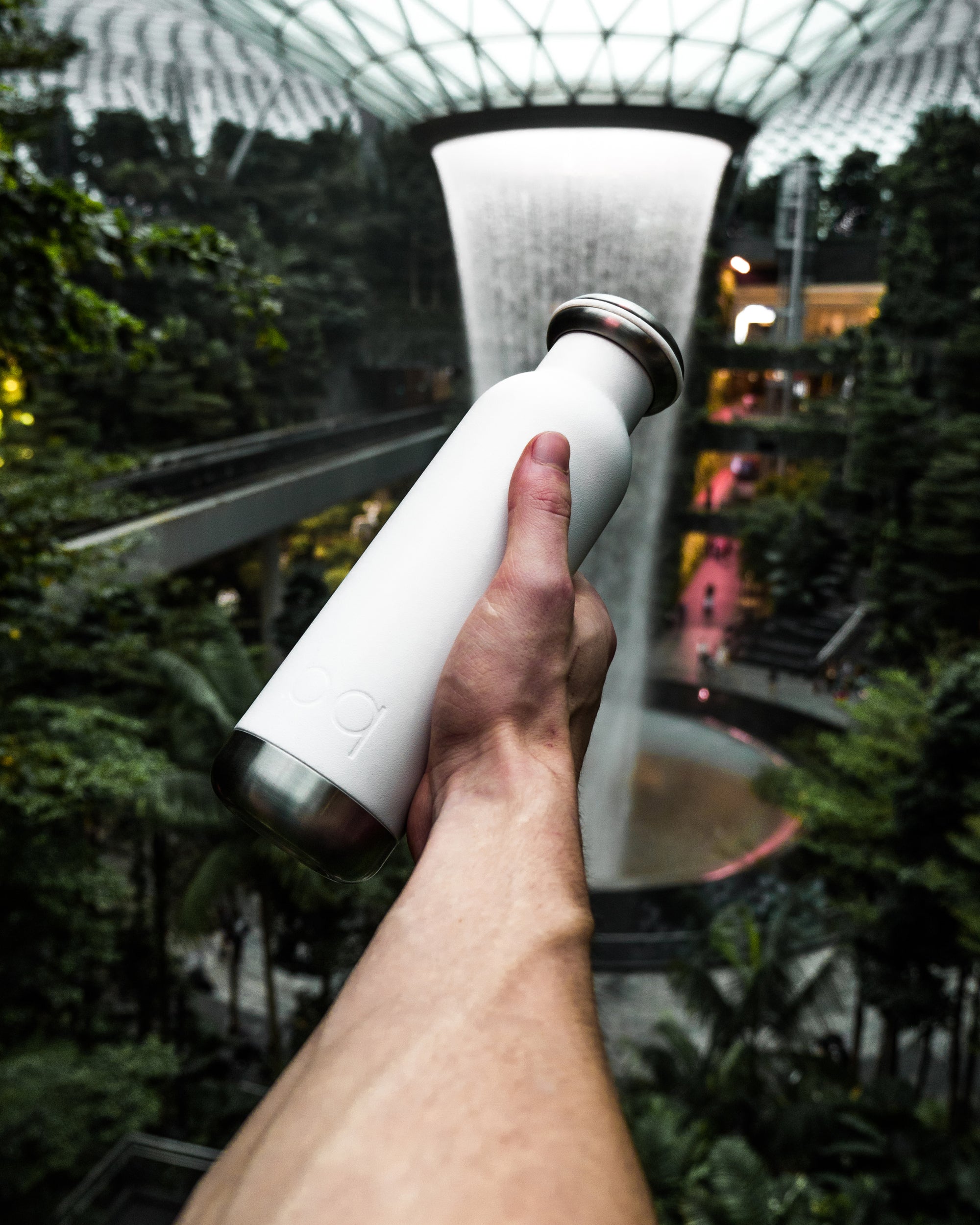 world travel with white bq bottle
